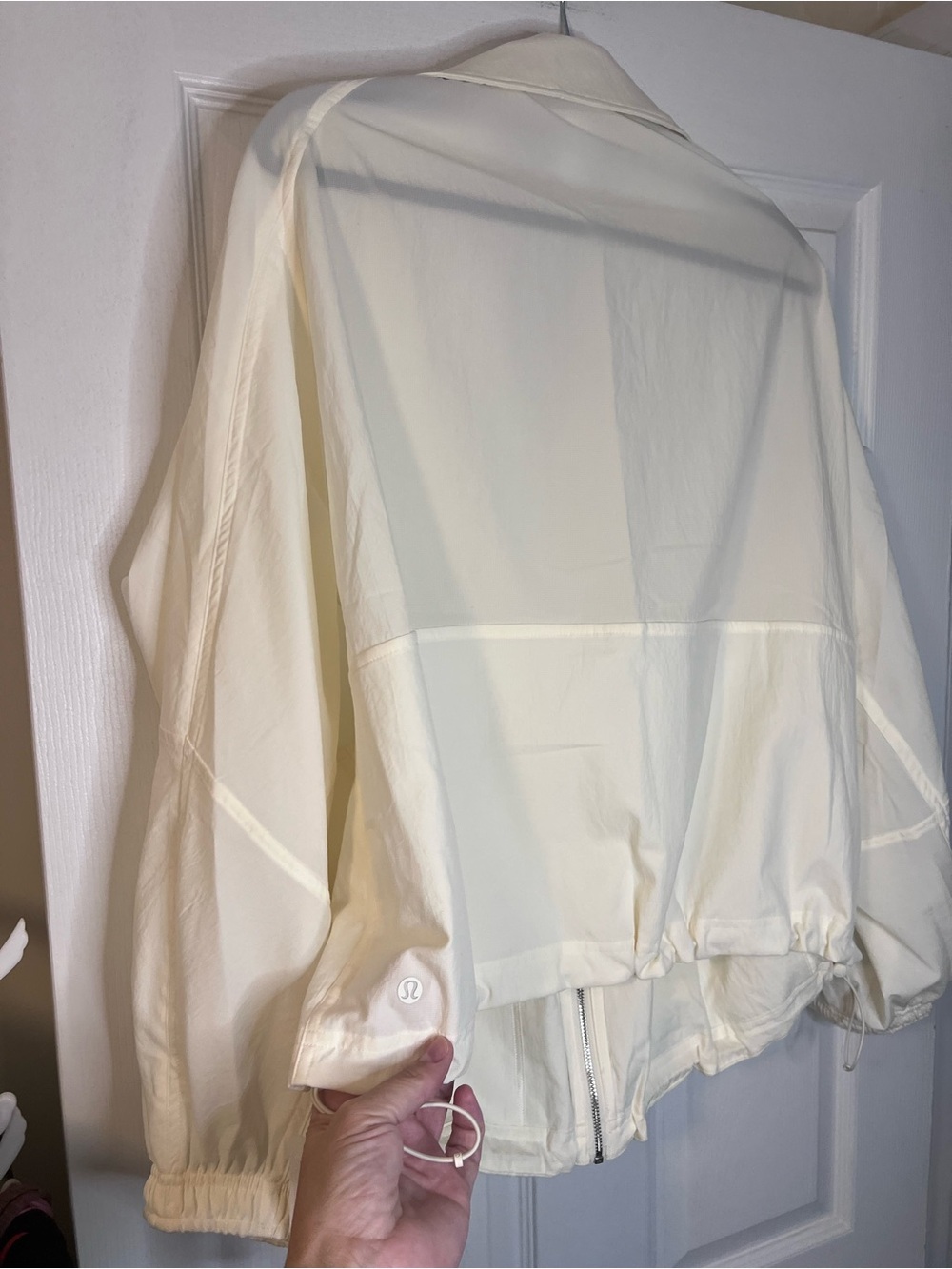 #862 Lululemon Ultralight WovenAir Jacket Coconut Ivory L NWT - Picture 4 of 5